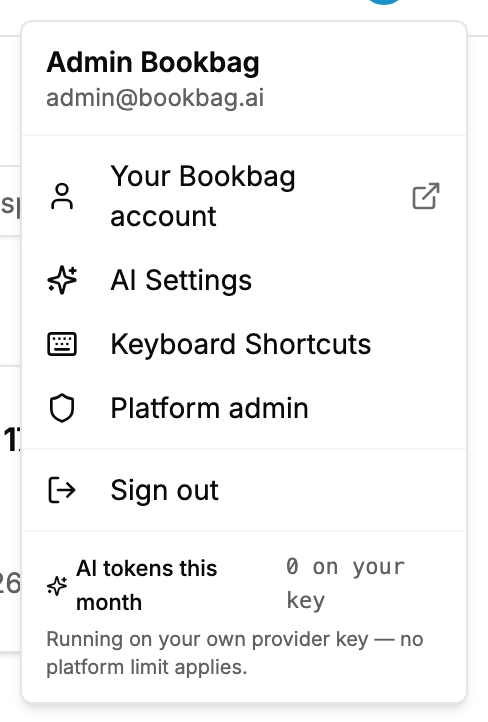 The Openbook account menu, with the AI tokens meter beneath Sign out